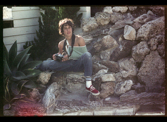 Poolside, shooting pictures, in Santa Monica at Arthur Lake's. October 1976 - Photograph by Hugh Holland